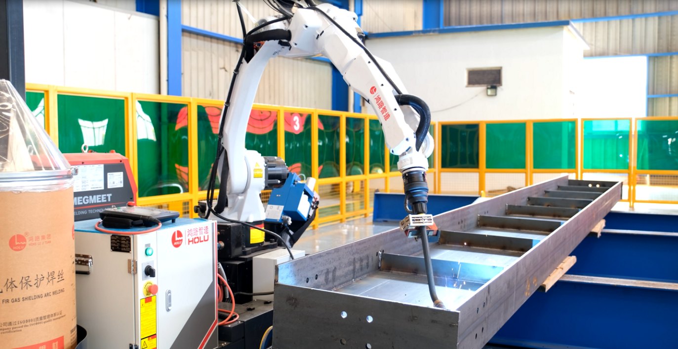 Honglu rail-mounted robotic welding workstation operating on a structural steel component